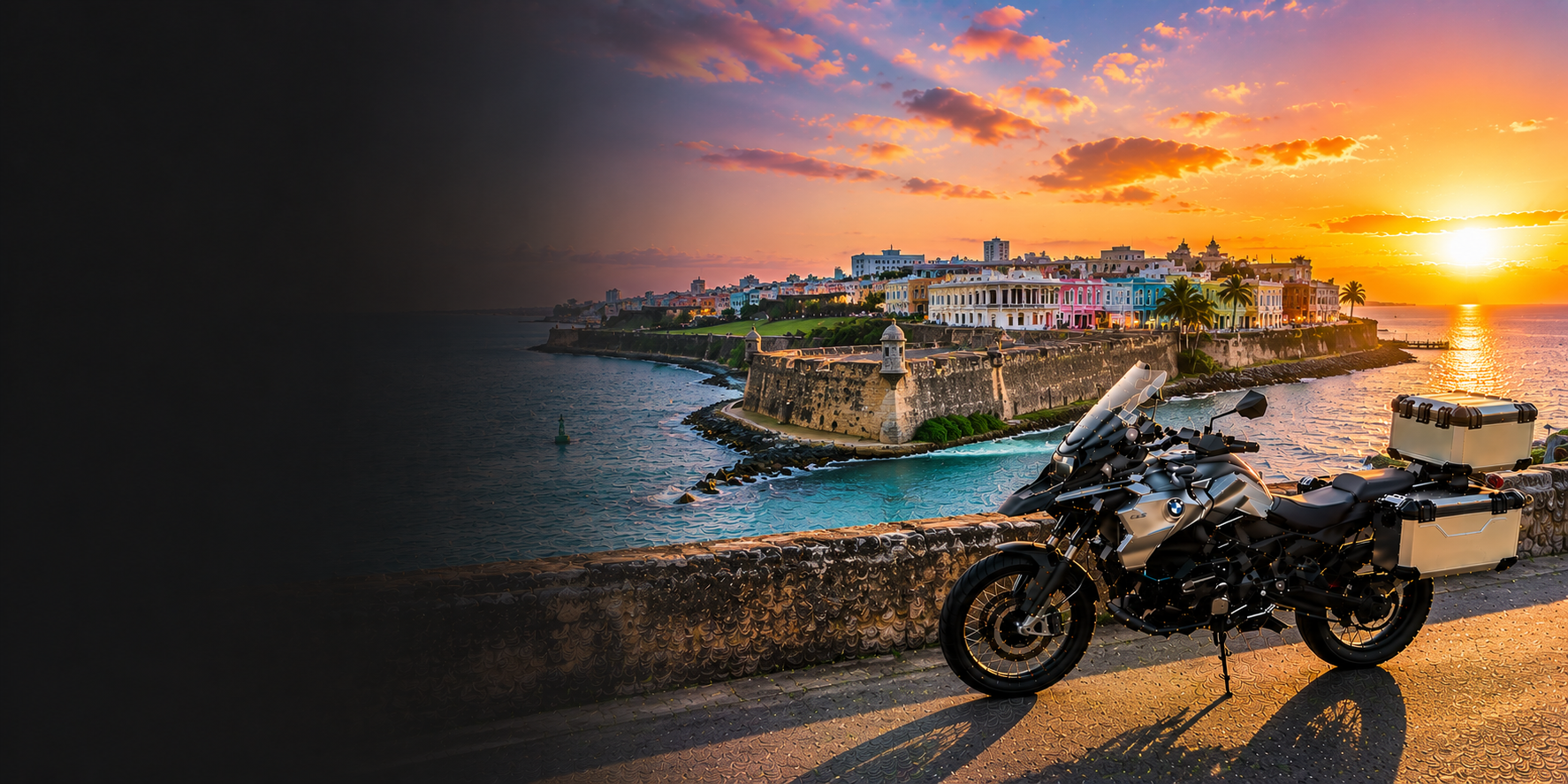 BMW adventure motorcycle beside a the Cliffs of Moher on Puerto Rico's Atlantic coast